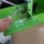 Finish mounting the chipper rotor by adjusting the bearing housing fasteners