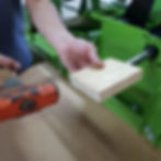 move the rotor towards the feed chute side by hammering the pulley's end with a piece of wood